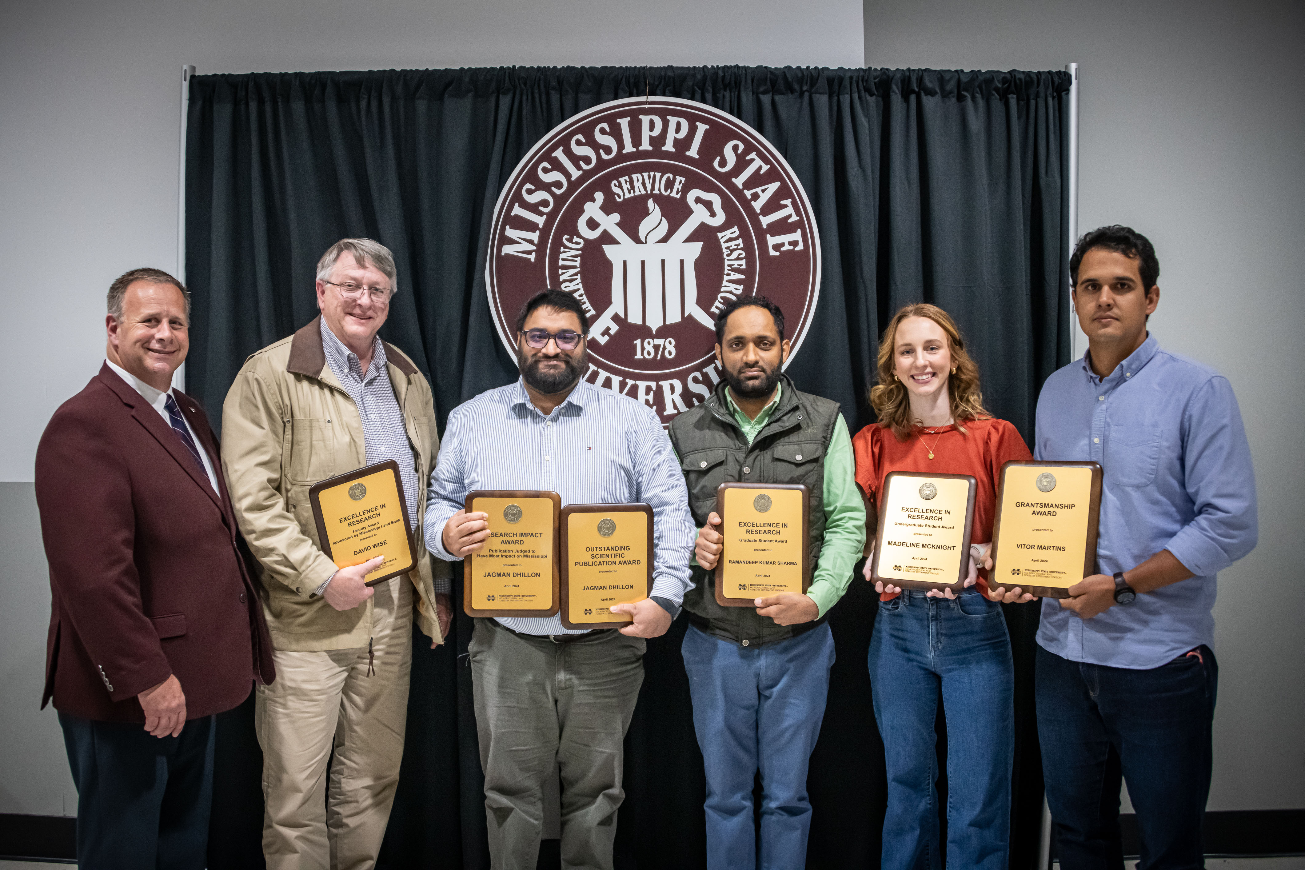 From left to right: CALS Dean and MAFES Director Scott Willard presents CALS teaching awards to Instructor Cappe Hallberg; Assistant Professor Ben Burke; Assistant Professor Kelsey Harvey; and Instructor II Angel Fason.